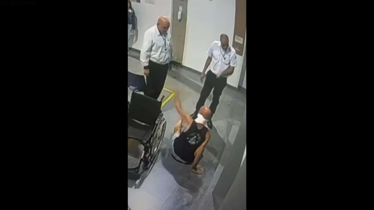 Confusão e violência segurança de hospital agride paciente em cadeira de rodas